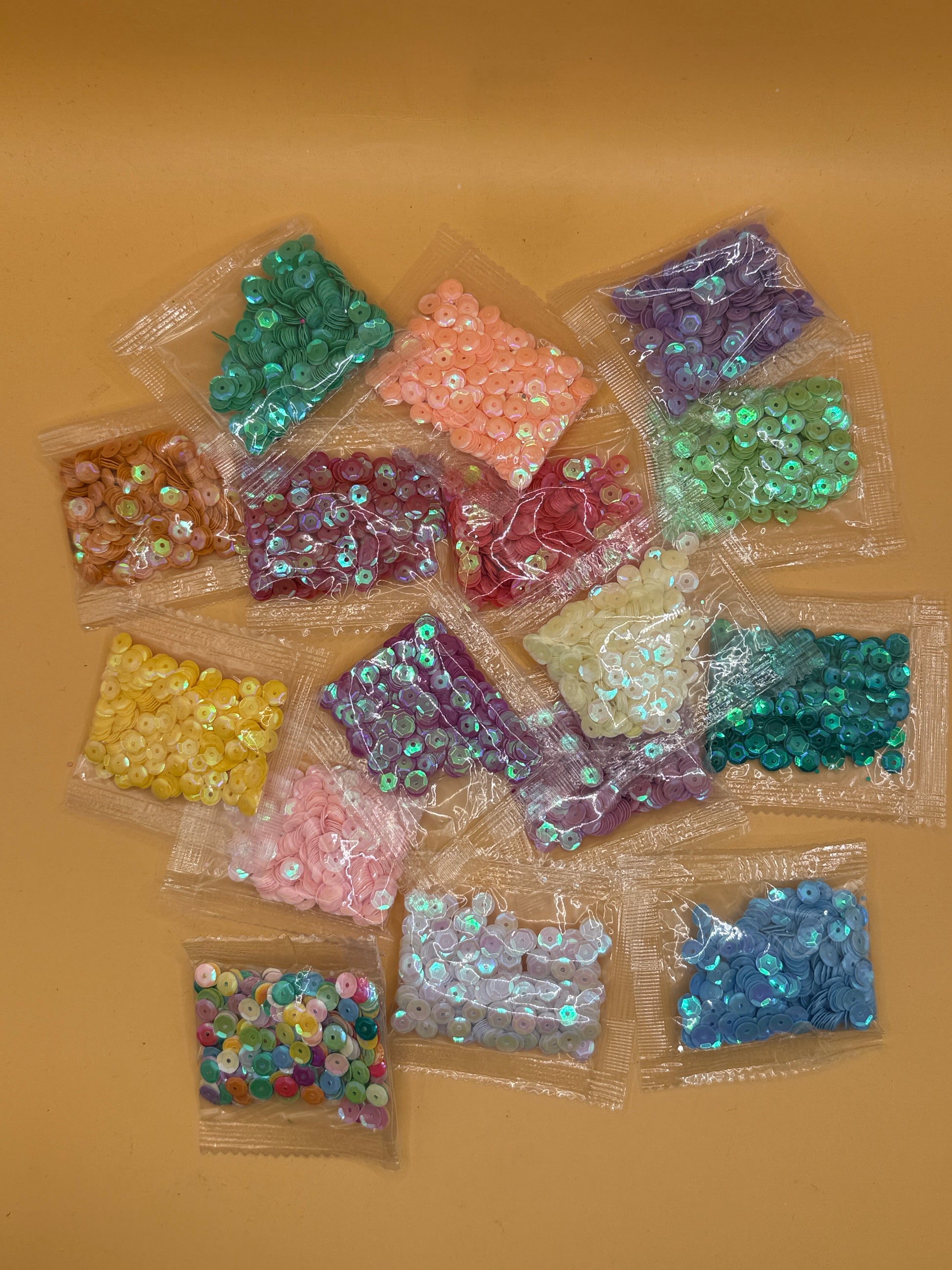 Assorted iridescent sequins in mixed colour craft packs