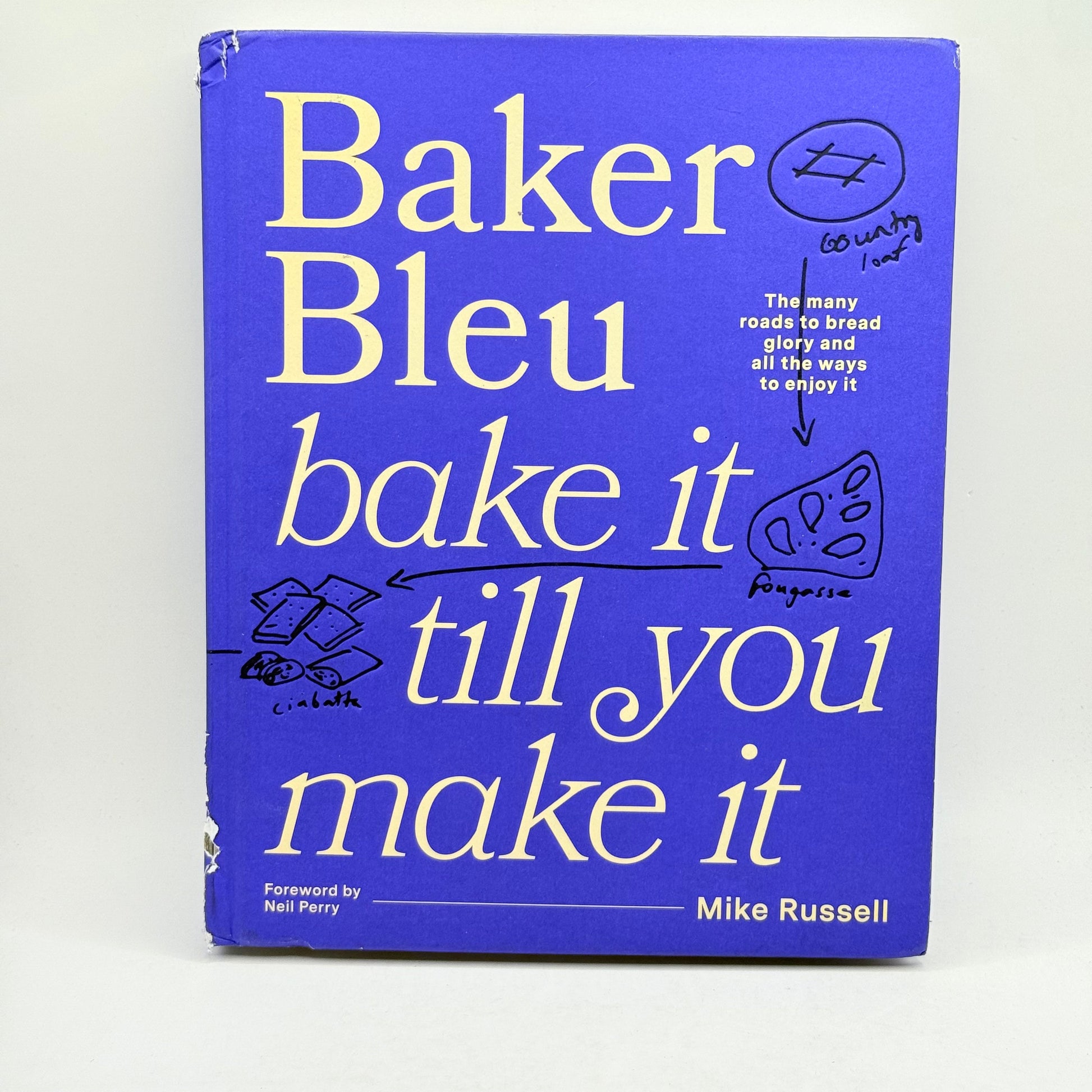 Baker bleu bake it till you make it by mike russell - print books condition: used - what’s new printed media