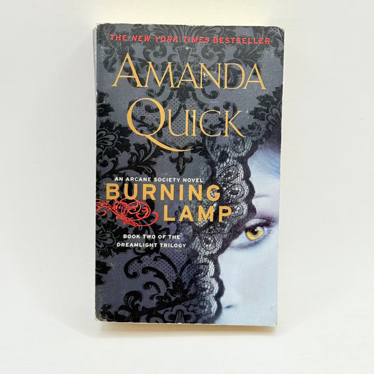 Burning lamp by amanda quick - print books condition: used - what’s new printed media