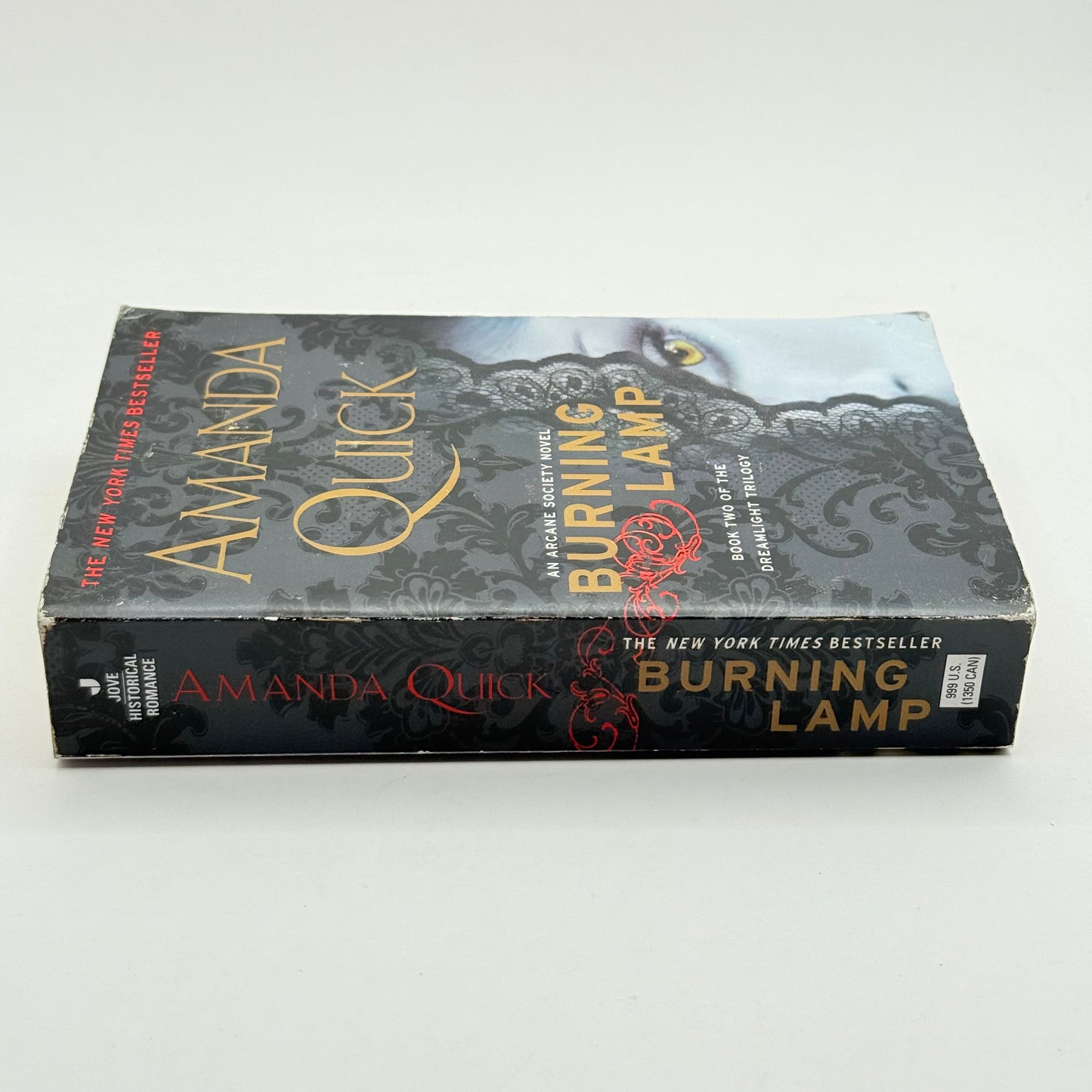 Burning lamp by amanda quick - print books condition: used - what’s new printed media