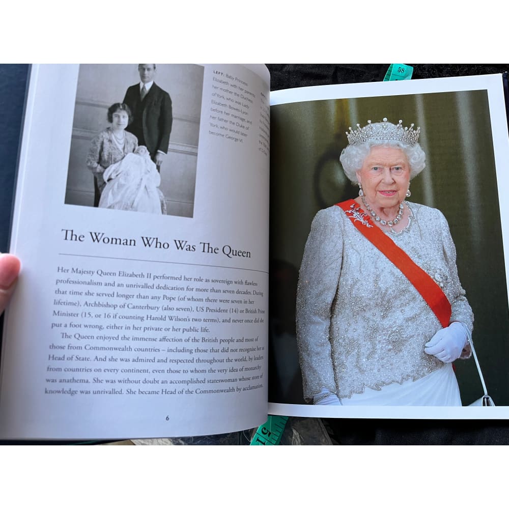 An open book featuring images and text about Queen Elizabeth II.
