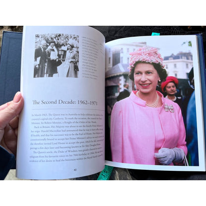 An open book showcasing historical content and photographs.