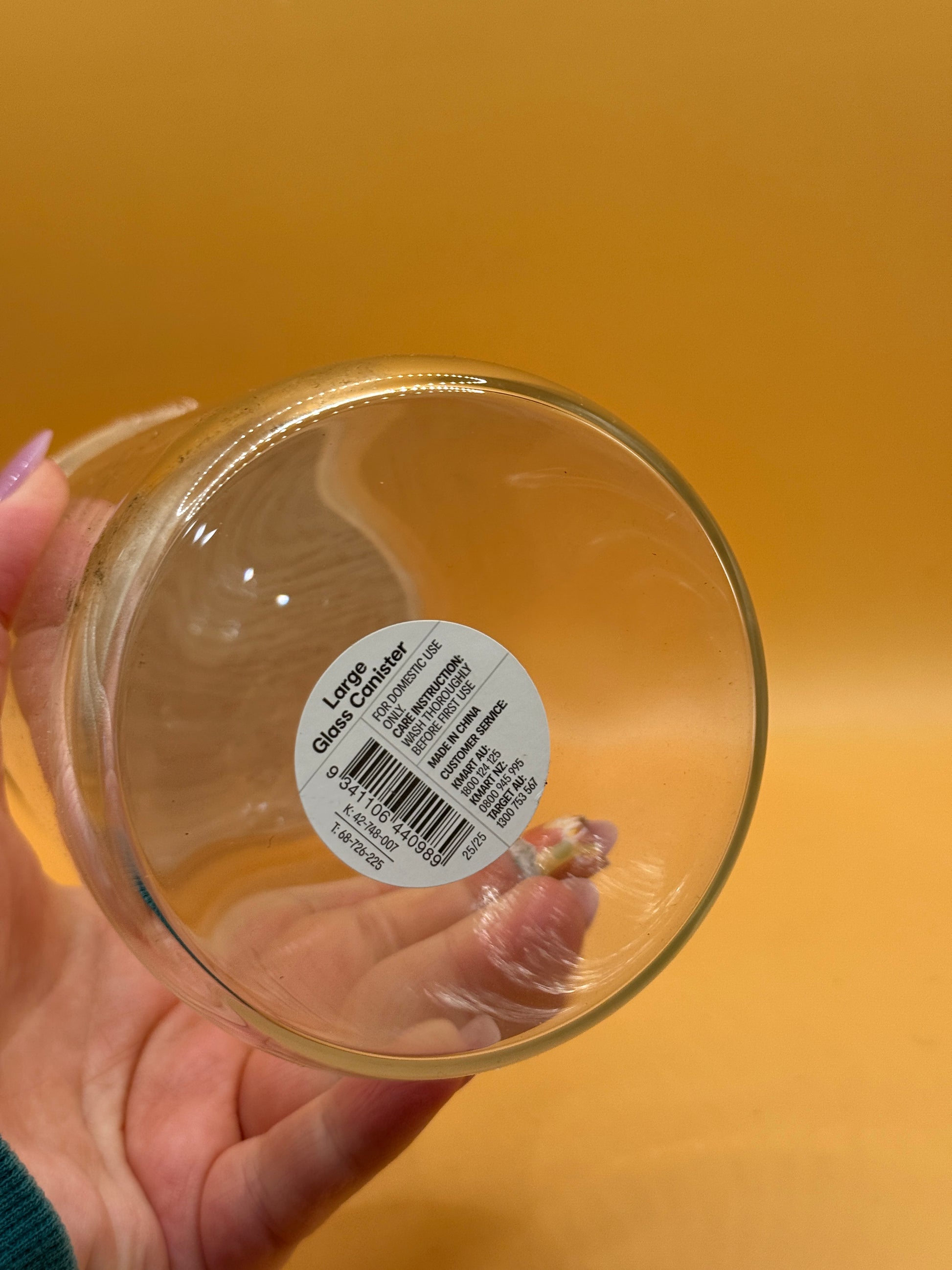 Base label on large glass canister