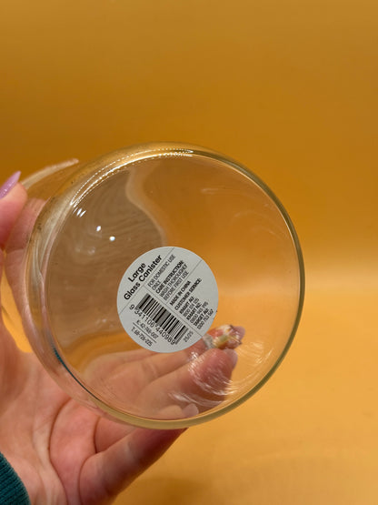 Base label on large glass canister