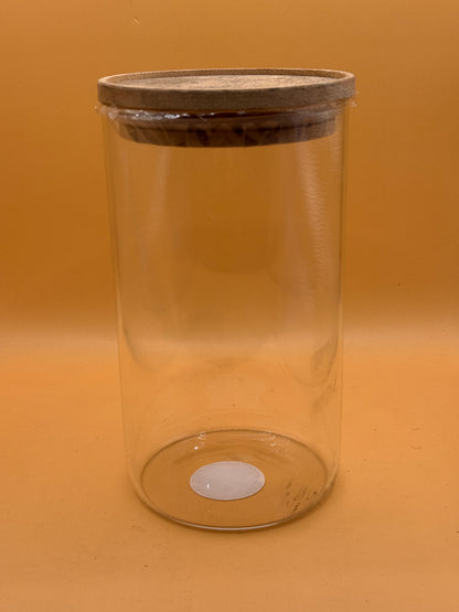 Large clear glass canister with natural finish lid