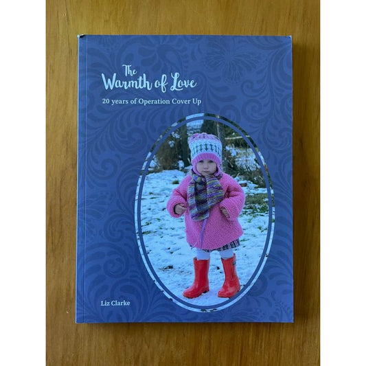 The warmth of love: 20 years of operation cover up - print books book - condition: used - health printed media