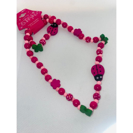 Kids’ pink ladybug and flower wooden beaded necklace - necklaces fashion accessories